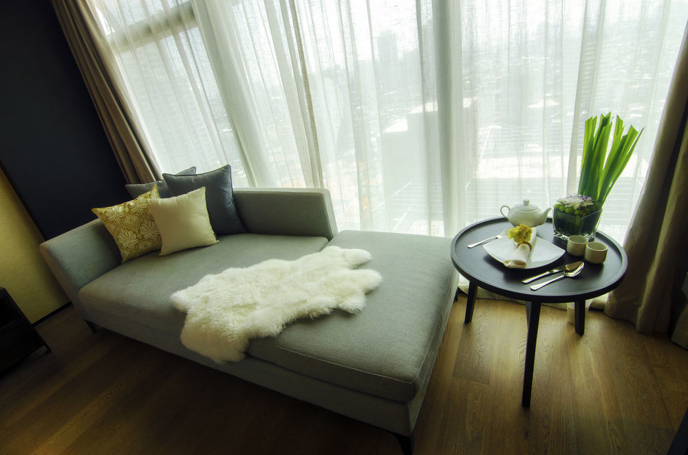 I'M Hotel Makati City Bagian luar foto A chaise longue